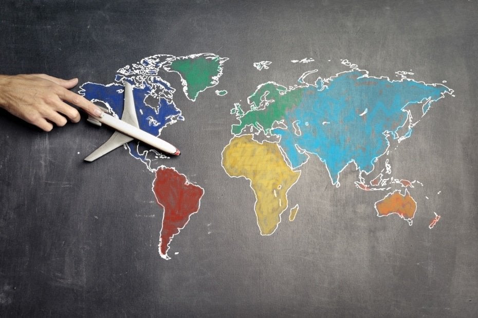 Flying To Korea: How To Get Cheap Flights To Korea In 2024 13 Plane flying over a map of the world